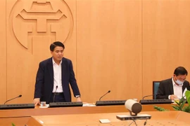 Chủ tịch Ủy ban Nhân dân thành phố Hà Nội Nguyễn Đức Chung phát biểu. (Ảnh: Lâm Khánh/TTXVN)