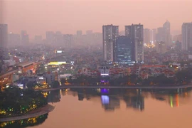 Bầu trời phía Nam Hà Nội mờ sương. (Ảnh: Ngọc Hà/TTXVN)