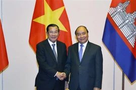 Thủ tướng Nguyễn Xuân Phúc và Thủ tướng Vương quốc Campuchia Samdech Techo Hun Sen sang dự Lễ Quốc tang nguyên Chủ tịch nước Lê Đức Anh. (Ảnh: Thống Nhất/TTXVN)