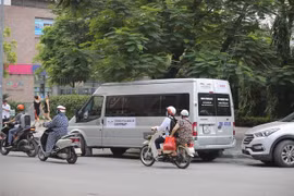 Xe đưa đón học sinh của Trường Tiểu học Gateway. (Ảnh: Minh Sơn/Vietnam+)