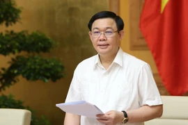 Phó Thủ tướng Vương Đình Huệ, Trưởng Ban Chỉ đạo phòng, chống rửa tiền chủ trì cuộc họp. (Ảnh: Dương Giang/TTXVN)