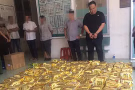 Tang vật và các đối tượng bị lực lượng công an TP. Hồ Chí Minh bắt giữ. (Nguồn: Cổng thông tin điện tử Công an TP.HCM)