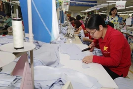 May hàng xuất khẩu. (Ảnh minh họa: Trần Việt/TTXVN)