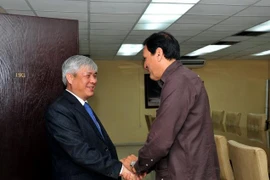 Phó Trưởng Ban Quan hệ quốc tế Trung ương Đảng Cộng sản Cuba Juan Carlos Marsán tiếp Phó Bí thư Thường trực Tỉnh ủy Sơn La Nguyễn Đắc Quỳnh. (Ảnh: Vũ Hà/TTXVN0