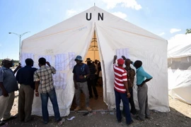 Cử tri Haiti tại một điểm bỏ phiếu ở Port-au-Prince ngày 9/8. (Nguồn: AFP/TTXVN)