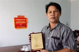 Anh Lê Văn Tám, người đã 47 lần hiến máu tình nguyện. (Ảnh: Nguyễn Thành/TTXVN) 