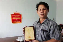 Anh Lê Văn Tám, người đã 47 lần hiến máu tình nguyện. (Ảnh: Nguyễn Thành/TTXVN) 