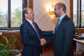 Đại sứ Việt Nam tại Áo Lê Dũng và Tổng Giám đốc Quỹ OPEC về phát triển quốc tế (OFID) Abdullhamid Alkhalifa. (Nguồn: Vietnam+) 