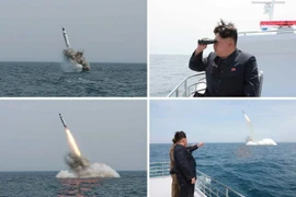 Nhà lãnh đạo Triều Tiên Kim Jong-un quan sát một vụ thử tên lửa đạn đạo từ tàu ngầm ở gần Sinpo, vùng bờ biển phía Đông Bắc Triều Tiên ngày 9/5/2015. (Nguồn: EPA/TTXVN)