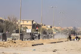 Quân đội Chính phủ Iraq trong cuộc chiến chống IS tại Mosul, Iraq ngày 10/12. (Nguồn: THX/TTXVN)