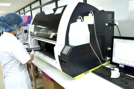Phòng khám-bệnh viện K tại Phan Chu Trinh được đầu tư thiết bị y tế hiện đại, trả kết ngay cho nguời dân đến tầm soát ung thư. (Ảnh: Dương Ngọc/TTXVN) 