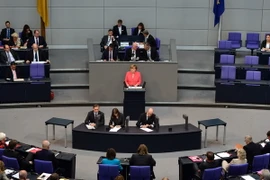 Thủ tướng Angela Merkel phát biểu tại phiên họp của Hạ viện Đức ở Berlin ngày 17/7. (Nguồn: AFP/TTXVN)