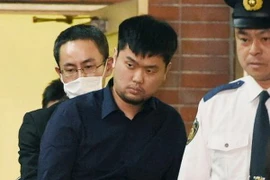 Đối tượng Chon Chang Han (giữa). (Nguồn: Kyodo/TTXVN)