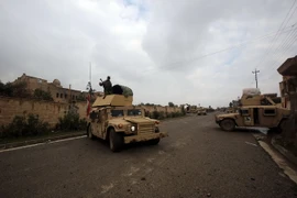 Binh sỹ Iraq gác tuần tra tại thành phố Mosul. (Nguồn: AFP/TTXVN)