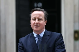 Thủ tướng Anh David Cameron phát biểu trước báo giới sau cuộc họp nội các ngày 20/2. (Nguồn: AFP/TTXVN)