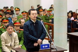 Bị cáo Nguyễn Quốc Khánh trả lời câu hỏi tại phiên tòa. (Ảnh: An Đăng/TTXVN)