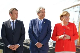 Thủ tướng Đức Angela Merkel (phải), Thủ tướng Italy Paolo Gentiloni (giữa) và Tổng thống Pháp Emmanuel Macron (trái) tại cuộc gặp ở Trieste, Italy ngày 12/7. (Nguồn: EPA/TTXVN)