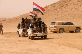 Các lực lượng Iraq tiến vào khu vực Anna, tỉnh Anbar trong chiến dịch chống IS ngày 20/9. (Nguồn: AFP/TTXVN)