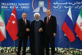 Tổng thống Nga Vladimir Putin, Tổng thống Iran Hassan Rouhani và Tổng thống Thổ Nhĩ Kỳ Tayyip Erdogan tại Hội nghị thượng đỉnh ba bên về Syria ở Tehran (Iran) ngày 6/9. (Nguồn: AFP/TTXVN)