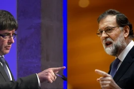 Thủ tướng Tây Ban Nha Mariano Rajoy (phải) và ông Carles Puigdemont (trái) khi còn giữ chức Thủ hiến vùng Catalonia. (Nguồn: AFP/TTXVN)