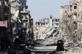 Cảnh đổ nát do xung đột ở Raqqa, Syria. (Nguồn: IRNA/TTXVN) 