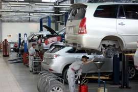 Các xe của Toyota đến sửa chữa, bảo dưỡng tại cơ sở Toyota Giải Phóng (Hà Nội). (Ảnh: Thế Duyệt/TTXVN)