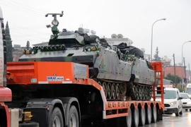 Xe tăng quân đội Thổ Nhĩ Kỳ được triển khai tới căn cứ quân sự ở tỉnh Hatay, giáp Syria ngày 18/1. (Nguồn: THX/TTXVN)