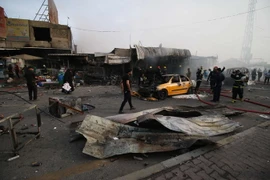 Hiện trường một vụ đánh bom đẫm máu ở Baghdad. (Nguồn: AFP/TTXVN)