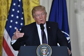 Tổng thống Mỹ Donald Trump trong cuộc họp báo ở Washington, DC ngày 12/4. (Nguồn: AFP/TTXVN)