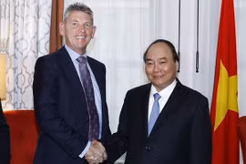 Thủ tướng Nguyễn Xuân Phúc tiếp ông Liam Mallon, Chủ tịch Công ty phát triển Exxon Mobile. (Ảnh: Thống Nhất/TTXVN)