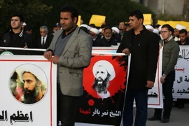 Biểu tình tại thủ đô Baghdad, Iraq, phản đối quyết định xử tử giáo sỹ Nimr al-Nimr ngày 3/1. (Nguồn: AFP/TTXVN)