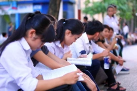 Thí sinh trong kỳ thi trung học phổ thông Quốc gia 2015. (Ảnh: Quý Trung/TTXVN)