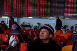 Một phiên giao dịch tại thị trường chứng khoán Thượng Hải, Trung Quốc. (Nguồn: AFP/TTXVN) 