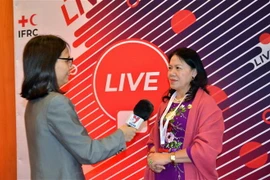 Chủ tịch Hội Chữ thập Đỏ Việt Nam Nguyễn Thị Xuân Thu trả lời phỏng vấn TTXVN tại Geneva. (Ảnh: Tố Uyên/TTXVN) 