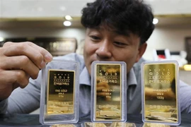 Vàng miếng được trưng bày tại sàn giao dịch ở Seoul, Hàn Quốc. (Nguồn: Yonhap/TTXVN) 