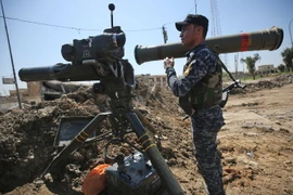 Các lực lượng Iraq ở Thành cổ Mosul trong chiến dịch giành lại quyền kiểm soát thành phố này từ phiến quân IS ngày 17/4. (Nguồn: AFP/TTXVN)