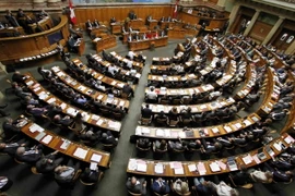 Các nghị sỹ trong ngày họp cuối cùng của phiên họp Quốc hội tại Bern, Thụy Sĩ ngày 25/9. (Nguồn: Reuters/TTXVN)