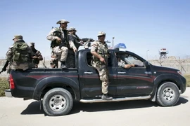 Các thành viên Phong trào Hồi giáo Hamas tập trung tại Rafah, phía Nam Dải Gaza, giáp giới Ai Cập ngày 21/4. (Nguồn: AFP/TTXVN)