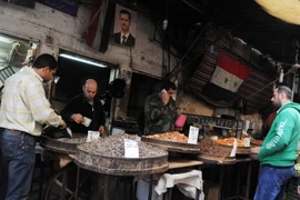 Người dân Syria được trở lại hoạt động thường nhật hàng ngày tại Damascus ngày 27/2, sau khi lệnh ngừng bắn có hiệu lực. (Nguồn: THX/TTXVN)