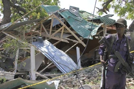 Hiện trường một vụ nổ ở Mogadishu. (Nguồn: AP)