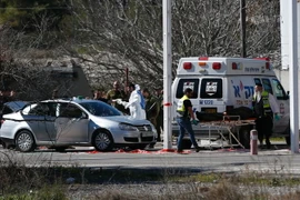 Hiện trường một vụ nổ súng giữa người Palestine và Israel tại Bờ Tây. (Nguồn: AFP/TTXVN)
