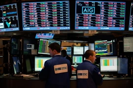 Giao dịch viên tại sàn giao dịch chứng khoán New York, Mỹ ngày 29/6. (Nguồn: AFP/TTXVN)