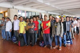 Các ngư dân Việt Nam tại sân bay quốc tế Soekarno Hatta, Jakarta trước khi về nước hồi tháng 7/2016. (Ảnh : Đỗ Quyên/TTXVN)