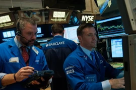 Giao dịch viên tại sàn giao dịch chứng khoán New York, Mỹ ngày 29/6. (Nguồn: AFP/TTXVN)