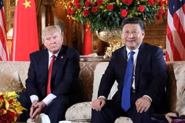 Tổng thống Mỹ Donald Trump (trái) và Chủ tịch Trung Quốc Tập Cận Bình. (Nguồn: Reuters) 