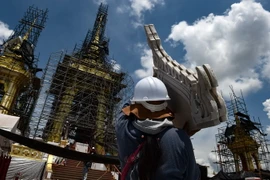 Người lao động làm việc tại thủ đô Bangkok, Thái Lan ngày 8/9. (Nguồn: AFP/TTXVN)