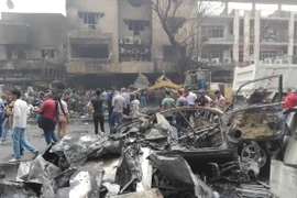 Hiện trường vụ đánh bom ở Karada, Baghdad ngày 3/7. (Nguồn: THX/TTXVN)