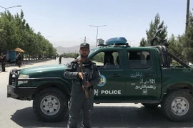 Cảnh sát gác gần hiện trường một vụ tấn công. (Nguồn: THX/TTXVN)