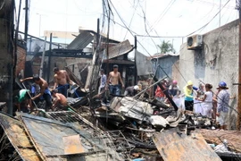 Hiện trường một vụ hỏa hoạn. (Ảnh: Lê Huy Hải/TTXVN)