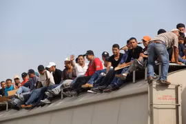 Người di cư Trung Mỹ tới bang Chiapas, Mexico để tìm đường sang Mỹ ngày 16/7/2014. (Nguồn: AFP/TXTVN)